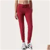 Yoga Outfit Ll Donne Ninth Push Fitness Leggings Soft Vita alta Hip Lift Elastico Casual Jogging 7 colori L2079 Drop Delivery Sport Dh2Rz