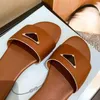 Sandales de luxe d'été Pantoufles de créateurs Femmes Tongs Pantoufle Mode Véritable Cuir Diapositives Chaîne en métal Dames Chaussures Casual 2024