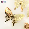 Adesivi murali 12Pcslot 3D Hollow Golden Silver Butterfly Wall Stickers Art Decorazioni per la casa Stickers murali per la festa di nozze Display Shop 230608