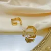 Um par de brincos banhados a ouro de aço inoxidável para mulheres e meninas, joias da moda 22*25 mm n816