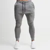 Men's Pants Fitness Joggers Men Gym Bodybuilding Clothing Cotton Sweatpants Pencil Trousers Workout Sweat