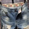 Jeans masculin 2023 Été européen et américain Ripped Cool Breezy pantalon droit taille cinq pantalons de mode pour hommes