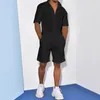 Tute da uomo Streetwear Abiti da spiaggia larghi da uomo 2023 Camicie con bottoni a bavero a maniche corte estive Top Pantaloncini da uomo in lino solido Completi a due pezzi