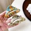 Koreanska ättiksyra hårtillbehör mode 7 cm medium ihålig triangel marmor hästsvansklipp för kvinnliga flickor