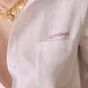 Bluzki damskie Rowling Mirror Biała amour bawełniana koszula Kobiet Lapel z długim rękawem pojedynczy piersi bluzka Vintage Resort Clothing