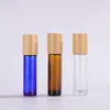 10ml cam esansiyel yağ şişeleri Bambu kapaklı yağ şişesinde temiz mavi Amber Rulo