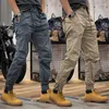 Pantaloni da uomo estivi e autunnali Cargo vintage da uomo elastico in vita multitasche allentato casual piede a grappolo di grandi dimensioni