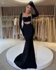 Elegantes schwarzes Meerjungfrau -Abendkleid mit floralen Perlenhülsen für Abschlussball oder formelle OCNs