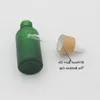Flacone contagocce in vetro trasparente antigelo 15ml 20 30ml con coperchio in bambù Bottiglie di olio essenziale Verde smerigliato Ojmuo