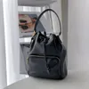 Designer Bucket Bag Luxury DrawString Påsar Black Purse Pouch Women Bucket Lady Messenger Bag Telefonväska Slingväska Kedja axelväska handväska toalettartikar