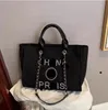 M Designer Bag Women Women Classic Tote Bagg Beach Handbag Flower Flower Laser Totes Idazzle Color Shopping PVC يحافظ