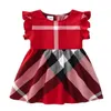 Nouveau Style Fille Robe D'été Enfants Vêtements Toddler Bébé Robes Flying Sleeve Plaid O-cou A-ligne Jupes Enfants Designers Cloting