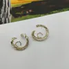 2023 Charme de qualité de luxe Boucle d'oreille à breloque de forme ronde avec diamant en plaqué or 18 carats avec boîte à timbres PS7084B