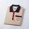 Polo da uomo Designer 2023 Estate Mens polo Camicie da uomo classico di lusso Tasca sul petto ricamo lettera stampa Magliette T-shirt con stampa a righe con risvolto polo casual 6