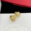 Leichte Luxusmarken-Ohrringe, Designer-Ohrringe, vergoldet mit Diamanten. Hochwertiges, schlichtes Design-Schmuckzubehör für Damen-Hochzeitsfeiern