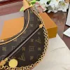 2023 حقيبة حلقة أكياس كرواسانت كتف مصمم مصمم حقيبة M81098 Half Moon Luxury Woman Baguette Underarm Handbag Subaxillary Package Collection