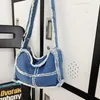 Avondtassen 2023 trendy crossbody schoudertasje zakken en jean portemonnees franje denim tas minimalistische designer jeans handtassen vrouwen