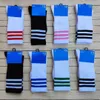 Chaussettes de créateurs pour hommes pour hommes brodés haut tube serviette bas chaussettes de sport de basket-ball chaussettes de course de sport pour hommes et femmes chaussettes hautes à trois barres pour femmes