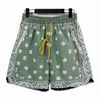 Shorts pour hommes Version haute Meichao Rhude High Street Fashion Brand Shorts de sport décontractés pour hommes et femmes imprimés de fleurs de cajou