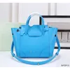 Designer wallet Ofx Tote Bag Women Tote with Iconic Round Hand Bag Meter Hollow Out Detachable Detail Shoulder Strap Built-in Zipper Pocket Main Sand handbag