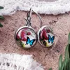 Boucles d'oreilles pendantes Vintage pâte ronde fleur papillon motif goutte classique couleur argent métal personnalité pour les femmes