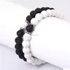 Bärda mode 8mm lava stenarmband Energy Healing Nce Black White Beads Armband för kvinnor Män Justerbar elastisk Yoga Drop Del Dhrmm