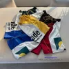 Shorts Masculino Rhude Panel Short Sunset Letter Printing Calça reta colorida shorts de ginástica Summer Shorts soltos masculinos