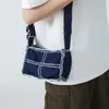Kvällspåsar 2023 Trendiga crossbody axelväska säckar en jean purses frans denim väska minimalist designer jeans handväskor kvinnor