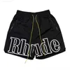 Mäns shorts sommarstrand avslappnad vintage tryck rhude shorts män kvinnor drar rep blå grön röd rhude shorts byxor tag