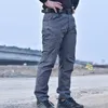 Pantalons pour hommes mode hommes en plein air tactique mâle poche multiple élasticité couleur unie militaire pantalon hommes mince gros Cargo pantalon