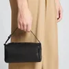 Le concepteur de sacs en rangée en daim baisse des années 90 Mini simple sac à main simple en cuir féminin européen et américain