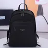 Estilo de mochila Clásico de lujo y para mujer Mochila de tela de nailon impermeable Gran capacidad Viaje de ocio Cremallera de paracaídas Mochila para hombre Bolsa para computadora