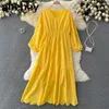 lång klänning broderad gul