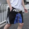 Mäns shorts Rhude Mesh Breattable Black Shorts Reflective Panel Tryckt High Street Drawstring Link Sports Shorts för män och kvinnor