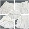 Kjolar houzhou sexig söt vit mini kjol kvinnor dragkammar vikar hög midja oregelbundet ruffle lapptäcke fairycore short mori girl 230609
