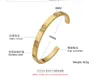 2023 Famoso braccialetto da donna con polsino aperto in acciaio inossidabile con zirconi cubici e zirconi