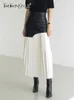 Юбки TWOTWINSTYLE Случайная пэчворчатая юбка PU для женщин с высокой талией миди -склад