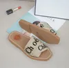 2023 Slippers Summer Rubber Sandals Beach Woody Flat Mule Linen White Slide Slide Fashion Scuffs Slippers Indoor Canvas Shoes