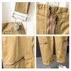 Pantaloni da uomo 2023 Tuta Tuta da uomo Cotone Allentato Multi tasca Cerniera Hip Hop Street Solid Moda casual Grande personalità Straig