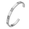 2023 Famoso braccialetto da donna con polsino aperto in acciaio inossidabile con zirconi cubici e zirconi