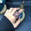 Kedjor eleganta öronstänger klipp lila blommepärlhalsband