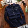 Camisas casuais masculinas Camisa jeans de algodão puro Jaqueta Primavera Moda masculina Manga longa lapela azul Bolso duplo Parte superior solta