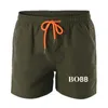 Marca impressa shorts masculinos de estilo esportivo de estilo respirável para homens elástico casual elástico seco rápido calças de praia