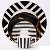 Juegos de vajilla Juego de 4 piezas Diseño negro moderno Cena de porcelana de hueso de cerámica para y regalo: Platillo de taza de café con plato