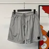 Shorts de pedra masculinos de grife de náilon Compass bordado logotipo Shorts esportivos respiráveis masculinos casuais soltos calças de secagem rápida calças de comprimento afiado calças curtas de verão