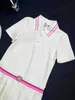 Polo Feminino Designer de Verão novo estilo menina fresco e doce lapela cintura baixa plissado manga curta Vestido Polo EYZD