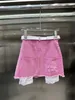 Designer de pantalons deux pièces pour femmes Nanyou Net Red 23SS New Pink Veste en jean à manches courtes Top Bag Hip A-line Taille haute Jupe Set NL1U