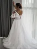 Superbes robes de mariée de taille plus taille en dentelle en dentelle applique gallage en V manches de capuchon de cou de cou à l'épaule tulle en perle de plage de plage de plage vestido de novia