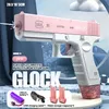 لعبة Glock Water Gun Toy المحمولة رذاذ المياه التلقائي المحمولة رذاذ المياه الكهربائية المسلحة المسلحة المسلحة الأطفال في الهواء الطلق معركة ألعاب