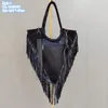 Borsa a tracolla da donna all'ingrosso in fabbrica 2 stili Borsa a tracolla in pelle con rivetto di tendenza nappa punk europea e americana